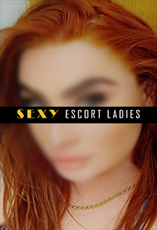 Lyla - Busty Redhead Escort